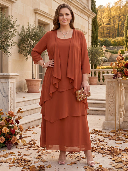 Ensemble 2 pièces pour mère de la mariée (grandes tailles) en mousseline : robe trapèze/princesse (encolure arrondie, manches 3/4, volants) et veste