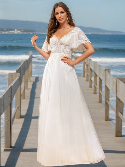 Robes de Mariée Trapèze/Princesse à Col en V et Manches Courtes Ornées de Perles