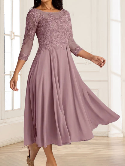 Robe de mère de la mariée, coupe trapèze/princesse, manches 3/4, longueur mi-mollet, ornée d'appliqués et de dentelle