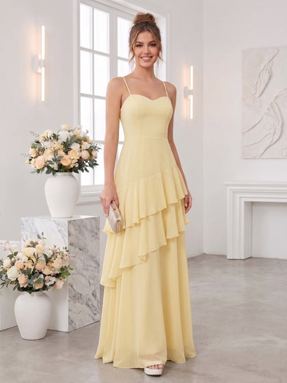 Robe de demoiselle d'honneur longue au sol trapèze, à bretelles spaghetti et volants