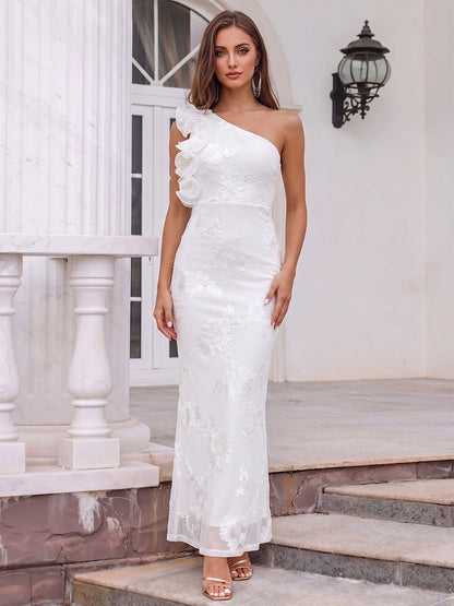 Robe de cocktail fourreau asymétrique longue cheville, avec volants et appliqués