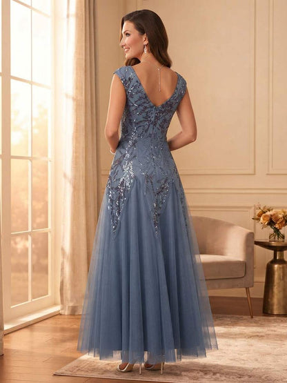 Robe de mère de la mariée longue, coupe trapèze/princesse, col en V, mancherons, avec paillettes et dentelle