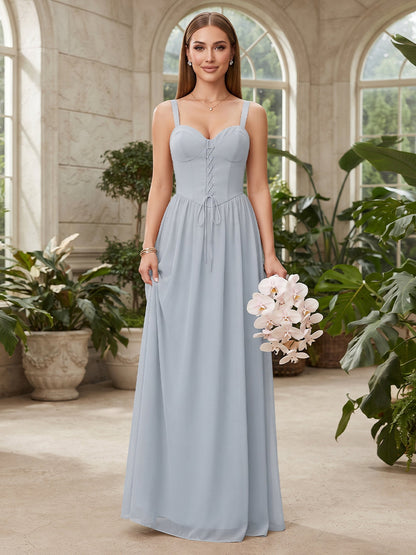 Robe de demoiselle d'honneur coupe trapèze/princesse, fines bretelles, sans manches, longueur au sol, en mousseline, avec nœud décoratif