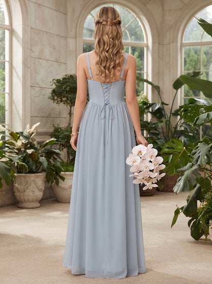 Robe de demoiselle d'honneur coupe trapèze/princesse, fines bretelles, sans manches, longueur au sol, en mousseline, avec nœud décoratif