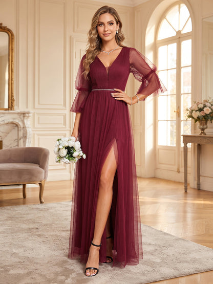 Robe de demoiselle d'honneur longue en tulle, coupe trapèze, col en V, manches 3/4, ceinture et fente latérale