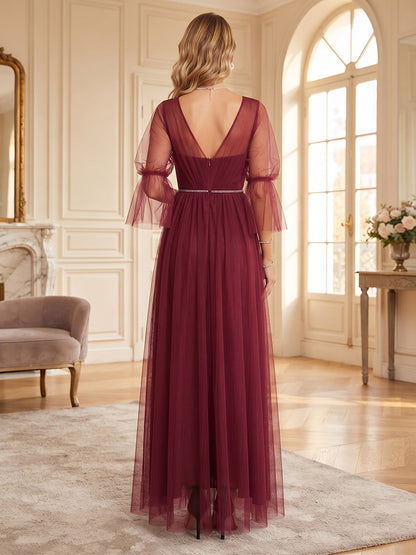 Robe de demoiselle d'honneur longue en tulle, coupe trapèze, col en V, manches 3/4, ceinture et fente latérale