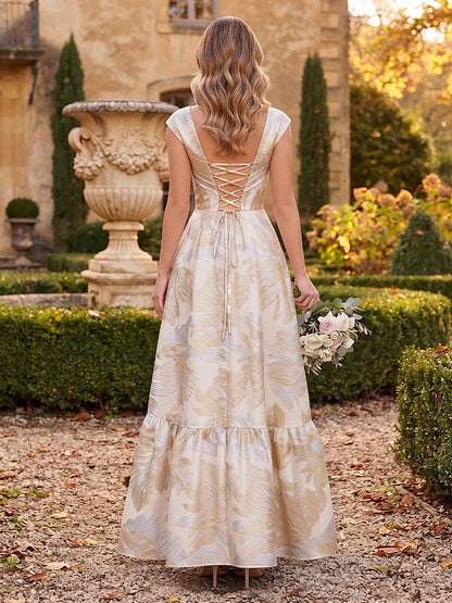 Robe de demoiselle d'honneur longue en jacquard, coupe trapèze/princesse, encolure carrée, mancherons et drapés