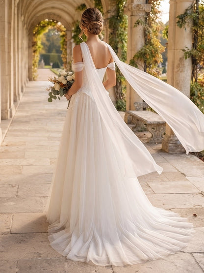 Robes de mariée en tulle, coupe trapèze/princesse, décolleté en cœur, sans manches, traîne courte, avec applications