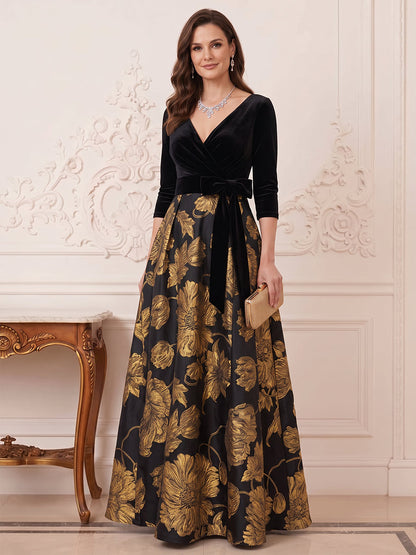 Robe de mère de la mariée longue en jacquard, coupe trapèze/princesse, col en V, manches 3/4 et nœud décoratif