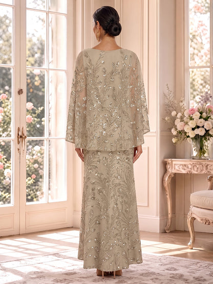 Robe de mère de la mariée longue en tulle, coupe fourreau, encolure arrondie, mancherons, sequins et applications