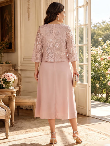 Robe trapèze/princesse en mousseline grande taille pour mère de la mariée : encolure ronde, manches 3/4, longueur mi-mollet, avec application