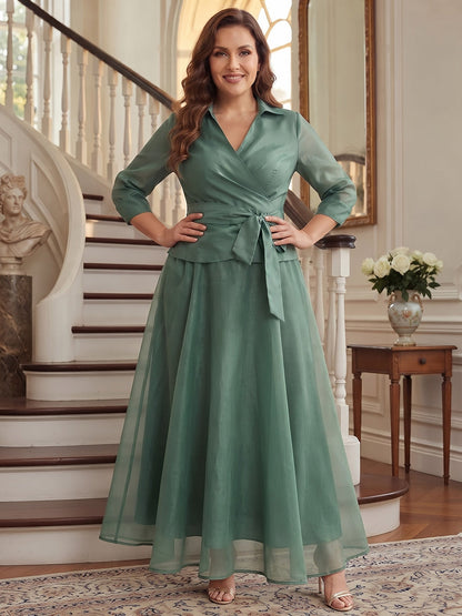 Robe trapèze/princesse en organza grande taille pour mère de la mariée : col en V, manches 3/4, longueur cheville, avec nœud