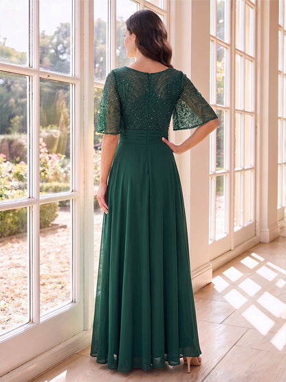 Robe de mère de la mariée longue, coupe trapèze/princesse, encolure ronde, manches mi-longues, avec perles et dentelle