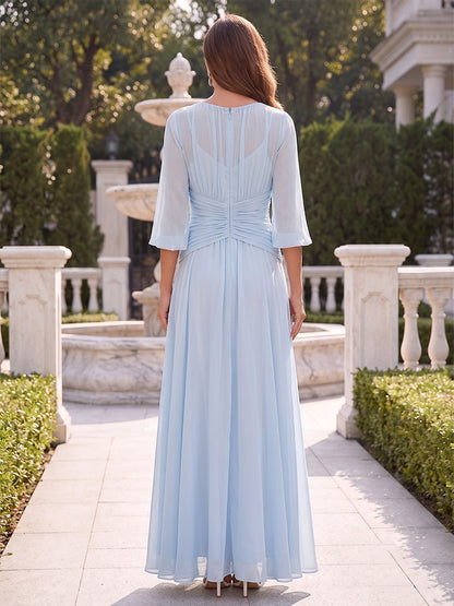Robe de mère de la mariée coupe trapèze/princesse, encolure arrondie, manches 3/4, longueur au sol, avec drapés