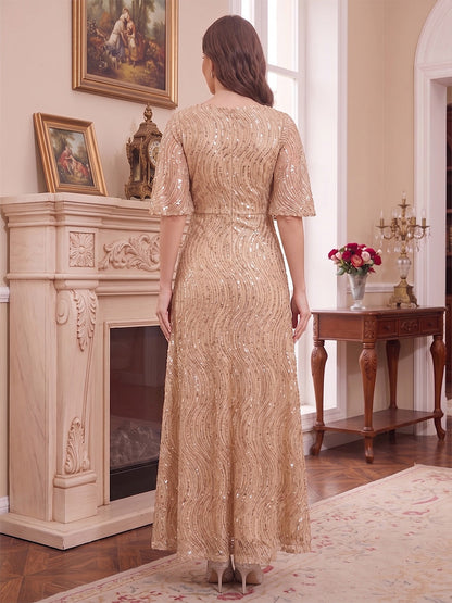 Robe de mère de la mariée coupe trapèze/princesse, encolure arrondie, manches mi-longues, longueur cheville, avec sequins