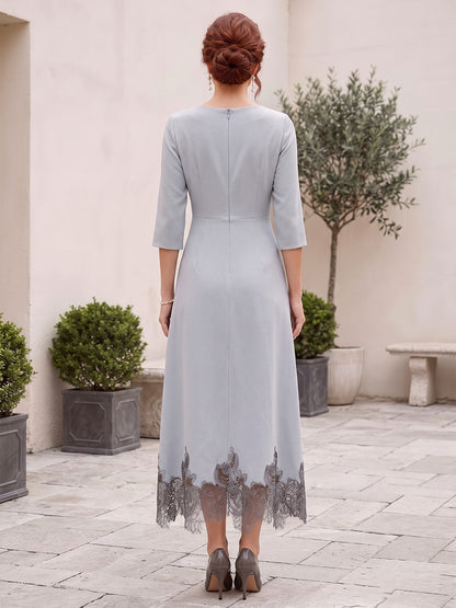 Robe de mère de la mariée coupe trapèze/princesse, asymétrique, manches 3/4, longueur midi, avec fleur décorative
