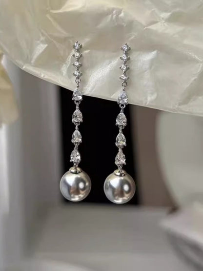 Boucles d'oreilles pendantes luxueuses en zircone et perles pour femmes