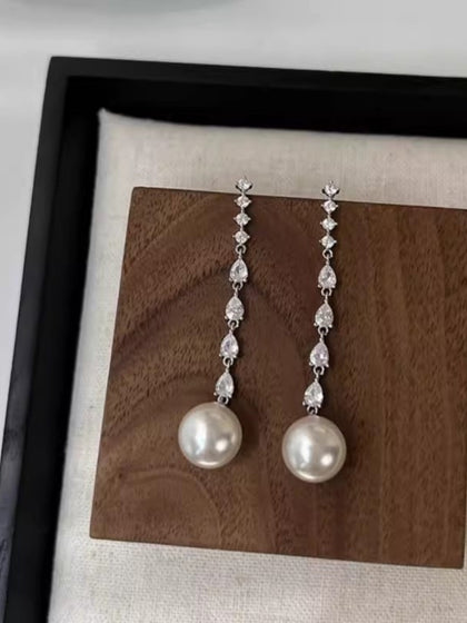 Boucles d'oreilles pendantes luxueuses en zircone et perles pour femmes