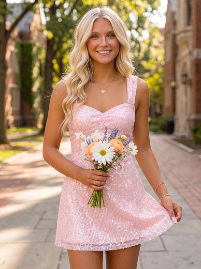 Mini-robe de soirée coupe fourreau, décolleté cœur sans manches, drapée en sequins