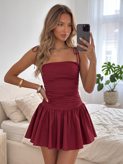 Mini-robe de soirée trapèze en satin de soie, sans manches, bretelles fines et nœuds décoratifs