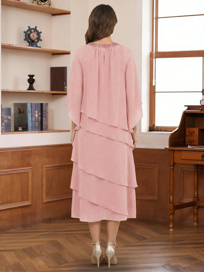 Robe de mère de la mariée, coupe trapèze/princesse, décolleté rond, manches 3/4, longueur thé, ornée de perles