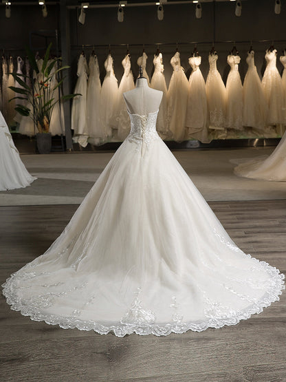 Bustier Sans Manches Tulle Applique Avec Perles Traîne Tribunal Robe De Bal Robes De Mariée
