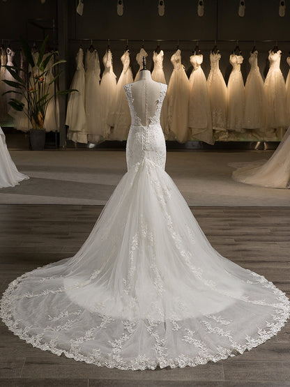 Trompette/Sirène Col plongeant Sans Manches Tulle Appliqué avec Perles Dos nu Traîne moyenne Robes de mariée