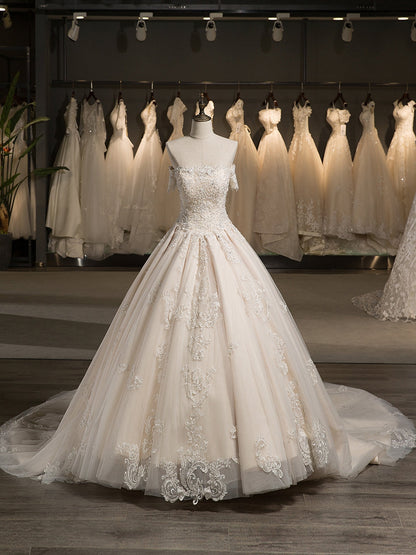 Épaules dénudées manches courtes tulle appliqué avec perles train tribunal robe de bal robes de mariée