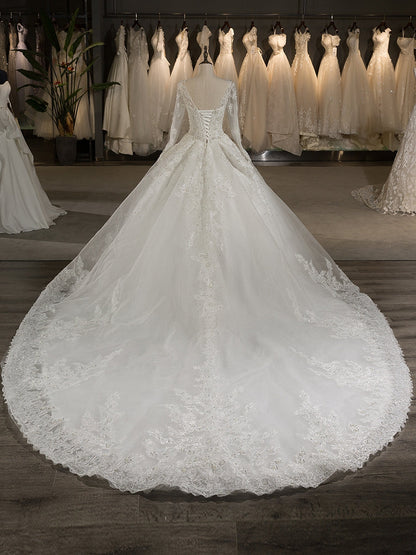 Scoop manches longues tulle appliqué avec perles chapelle train robe de bal robes de mariée
