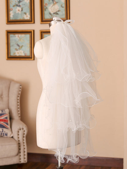 Joli tulle 4 couches avec nœud papillon et perles, voile de mariage