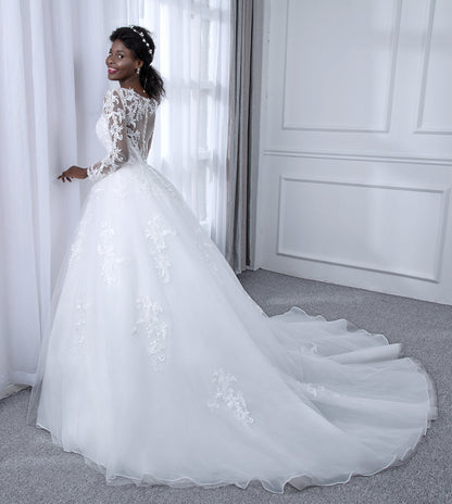 Robes de mariée robe de bal en tulle à col transparent avec manches longues et appliques