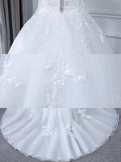 Robes de mariée robe de bal en tulle à col transparent avec manches longues et appliques