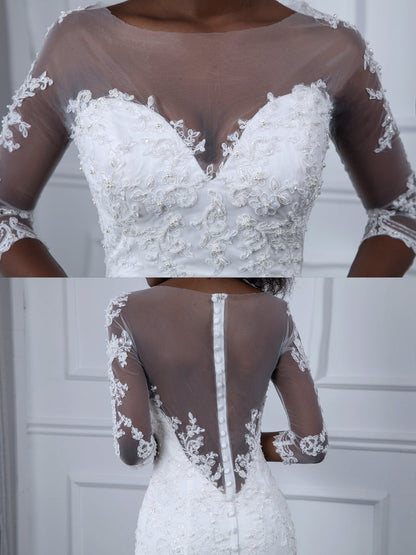 Robes de mariée sirène en tulle à manches 3/4 et col transparent avec appliques de perles