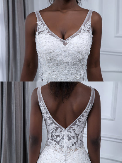 Robes de mariée sirène en tulle sans manches à col en V avec appliques de perles et paillettes