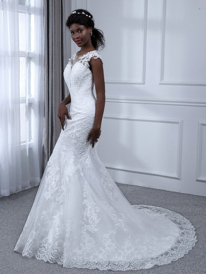 Robes de mariée sirène en tulle sans manches à col transparent avec appliques